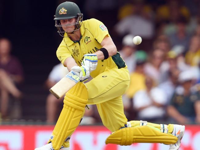 Australian batsman Steve Smith flicks a ball fine from the Sri Lanka bowling during their 2015 Cricket World Cup Group A match in Sydney on March 8, 2015. AFP PHOTO / William WEST --IMAGE RESTRICTED TO EDITORIAL USE - STRICTLY NO COMMERCIAL USE--