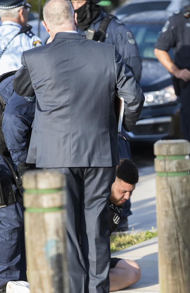 Police raid a Greenacre home and arrest Muhammad Khodar Ali Ahmed. Picture: Jenny Evans