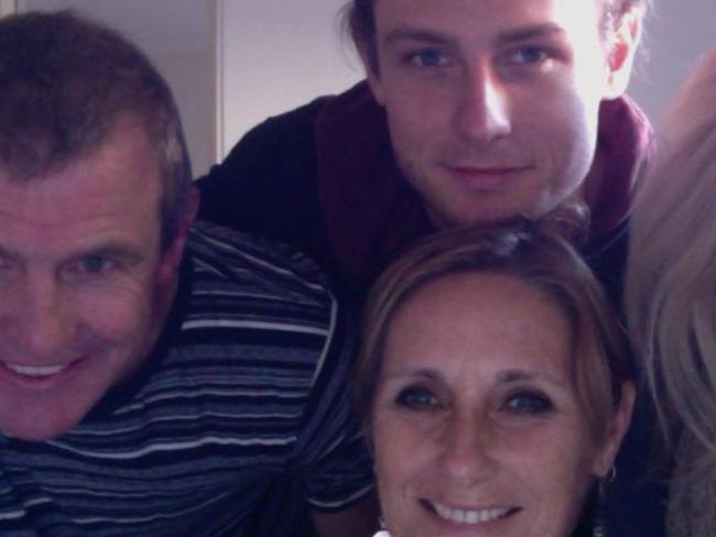 Phil Walsh with his wife and son Cy.