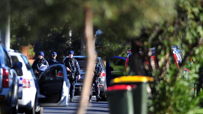 Heavily-armed police cleared the area.