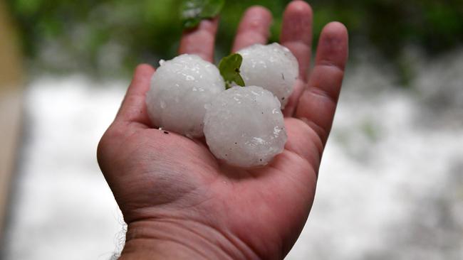 Golf ball-sized hail. Picture: Mick Tsikas