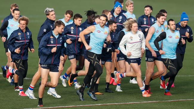 Marcus Bontempelli, centre, and his Bulldogs teammates will travel to the SCG on Thursday night to play the Swans Picture: Getty Images