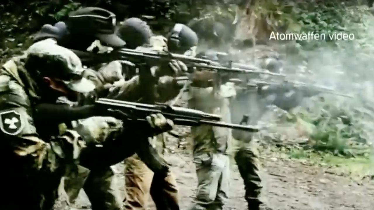 A screenshot from a video by Neo-Nazi group Atomwaffen Division as they train outside Seattle.