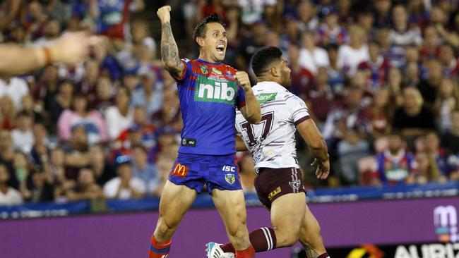 Mitchell Pearce celebrates his match-winning field goal.