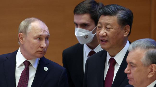 Russian President Vladimir Putin, China's President Xi Jinping and Uzbek President Shavkat Mirziyoyev at a leaders' summit on September 16. Picture: Sergei Bobylyov/Sputnik/AFP