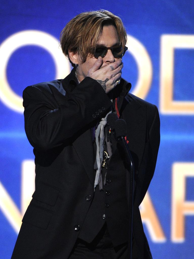 Johnny Depp presents the Hollywood documentary award on stage at the Hollywood Film Awards at the Palladium on Friday, Nov. 14, 2014, in Los Angeles. Picture: AP