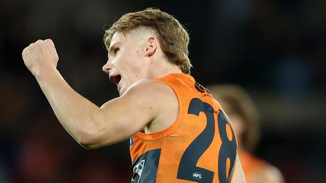 CANBERRA, AUSTRALIA - APRIL 25: Harvey Thomas of the Giants celebrates kicking a goal  during the round seven AFL match between Greater Western Sydney Giants and Brisbane Lions at Manuka Oval, on April 25, 2024, in Canberra, Australia. (Photo by Mark Metcalfe/AFL Photos/via Getty Images )