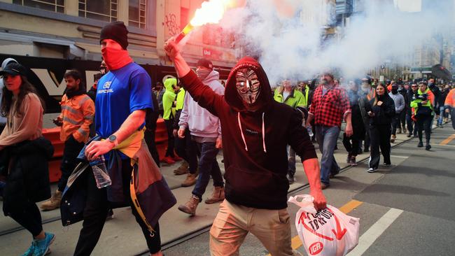 Construction workers and protesters march through Melbourne’s CBD. Picture: Aaron Francis