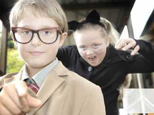 Luc Veitprince (aka Kevin Rudd), 8, lays down the law to Erika Butcher (aka Catwoman), 9, at Lismore Heights Primary School. . Picture: marc stapelberg