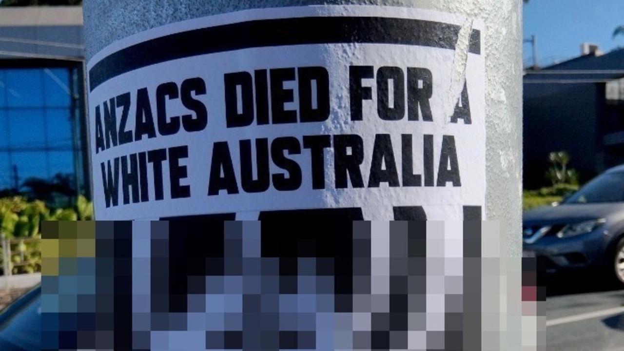 Police called as vile sign posted at inner Brisbane intersection