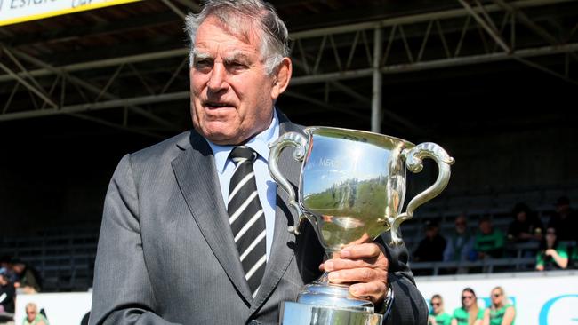 Sir Colin Meads holds the Meads Cup ahead of the match between South Canterbury and Wanganui.