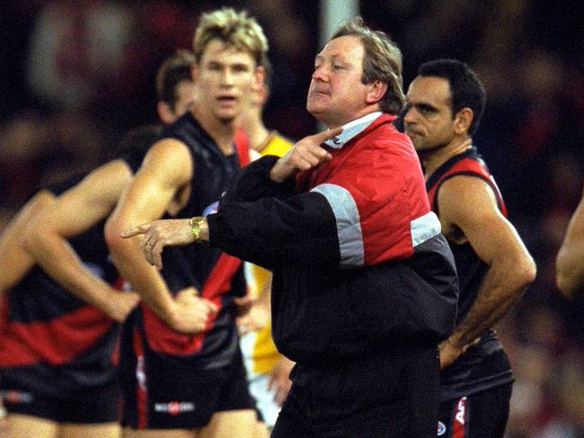 Coach Kevin Sheedy drawing finger across his throat gesturing angrily at Mitchell/White after second quarter incident.ALF football - Essendon vs West Coast Eagles match at Colonial Stadium in Melbourne 17 Jun 2000. (NB: Mandatory Credit: Darren McNamara ALLSPORT