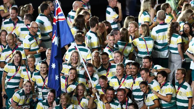 Kurt Fearnley and other Australian athletes during the closing ceremony of the Gold Coast Games in April. Picture: Michael Steele / Getty Images