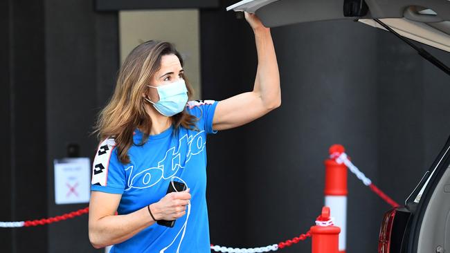 French star Alize Cornet leaves her hotel for a practice session in Melbourne Picture: AFP