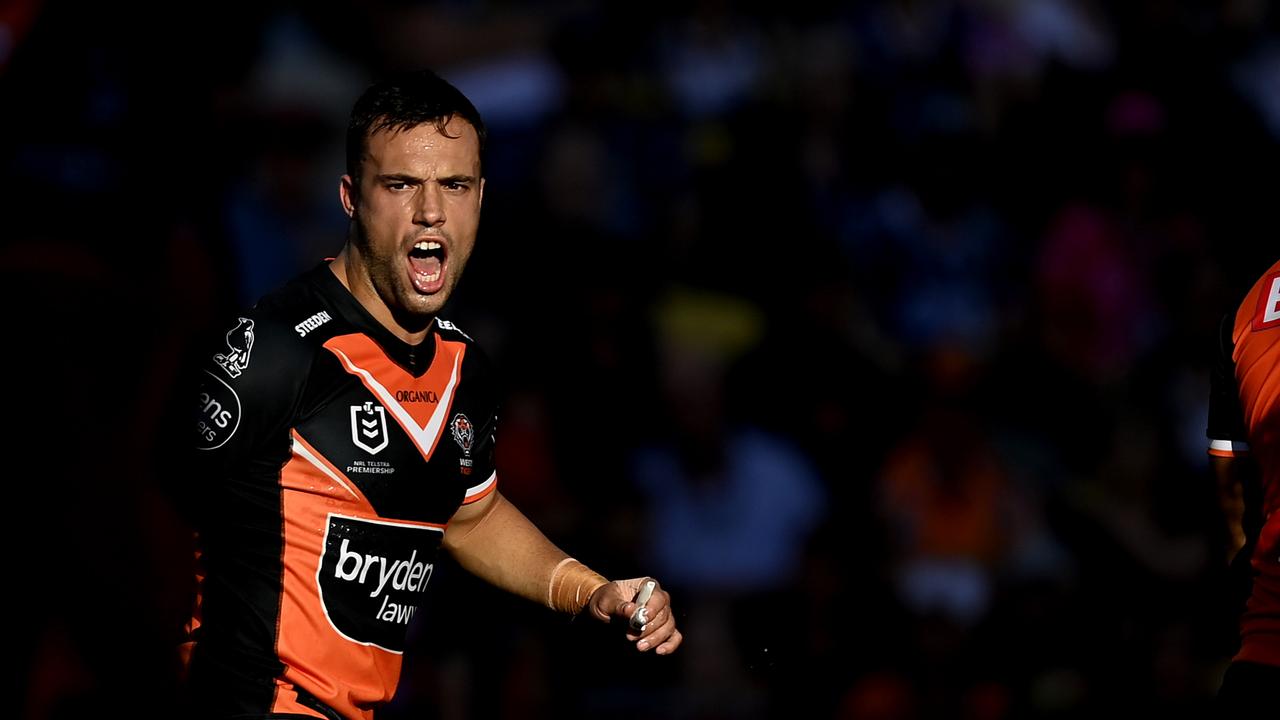 TOWNSVILLE, AUSTRALIA - JULY 24: Luke Brooks of the Tigers yells out during the round 19 NRL match between the North Queensland Cowboys and the Wests Tigers at Qld Country Bank Stadium, on July 24, 2022, in Townsville, Australia. (Photo by Ian Hitchcock/Getty Images)