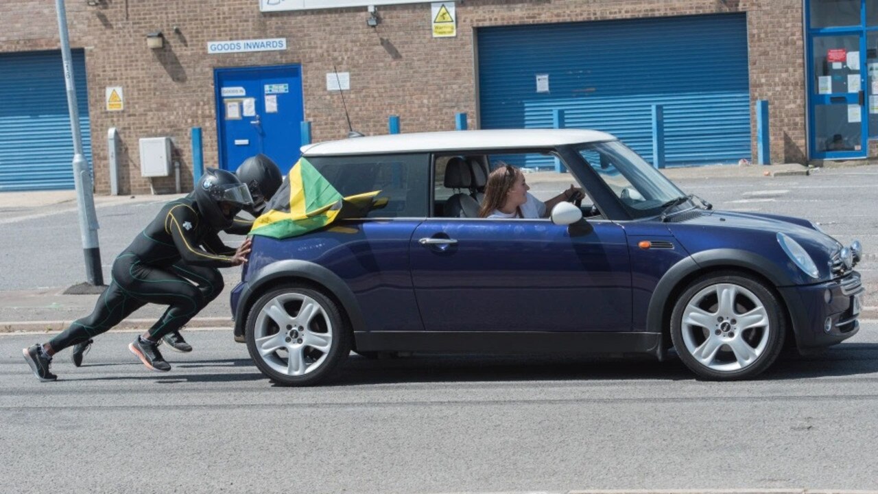 What a sight! Jamaica’s bobsleigh team are training by pushing a Mini Cooper. Credit: Andrew Styczynski