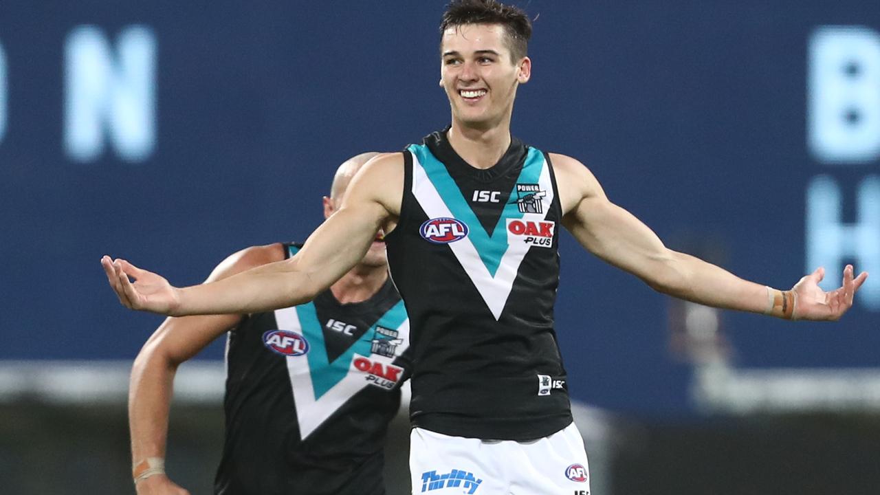 Connor Rozee celebrates one of his five goals against Brisbane. Picture: Chris Hyde/Getty Images