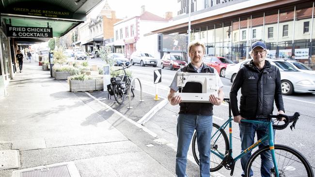 Seven car spaces are transformed into restaurant area. Photograph shows Grant McCarthy business owner of Easy Sew and Chris Riley business owner of Ken Self Cycles. Picture Eddie Safarik.