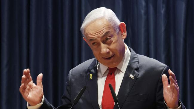 Israeli Prime Minster Benjamin Netanyahu speaks at the reopening ceremony of the Paraguayan embassy in Jerusalem in the presence of Paraguay's president, on December 12, 2024. Paraguay had already moved the diplomatic mission in 2018 under President Horacio Cartes but the decision was later overturned by  Mario Abdo Benitez when he became president until 2023. (Photo by GIL COHEN-MAGEN / AFP)