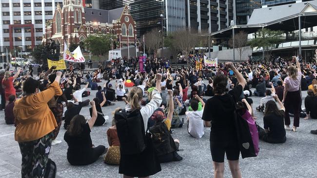 Protesters gather in King George Square on Friday night.