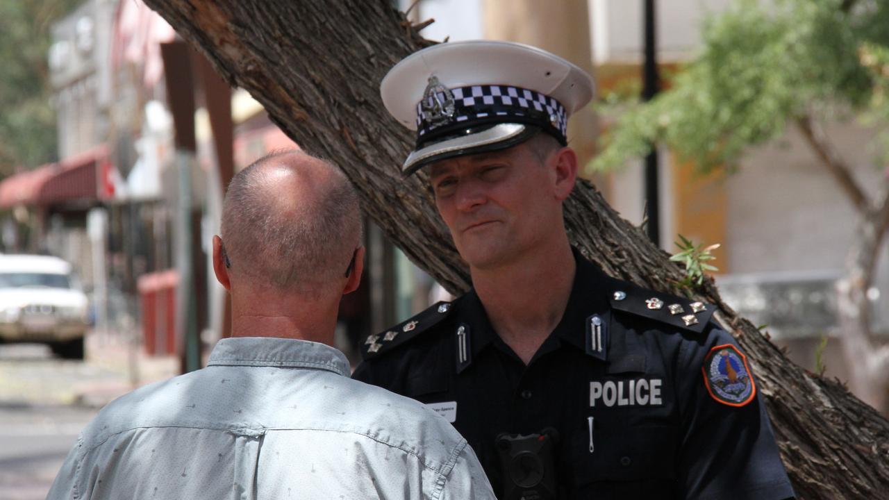 Aboriginal Fabric Gallery owner Robert Smit chats with Northern Police Southern Commander James Gray-Spence. Picture: Gera Kazakov