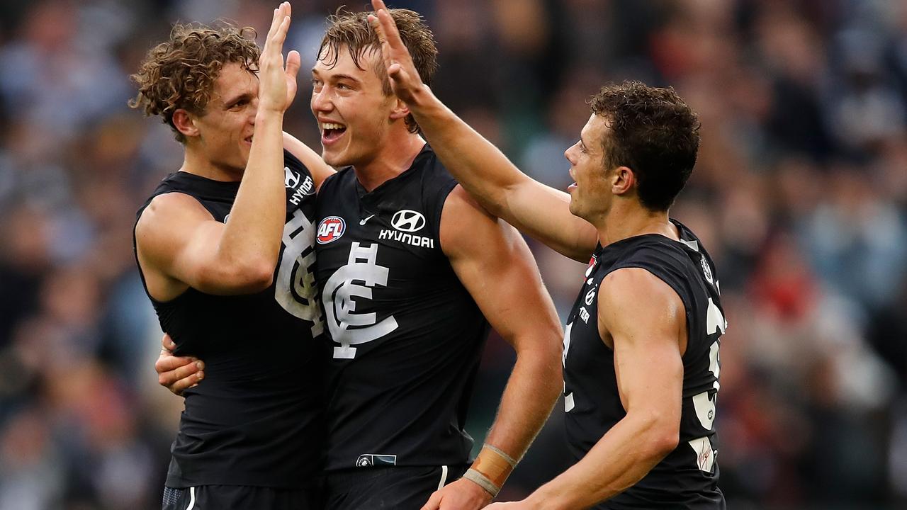 Charlie and Ed Curnow playing together in 2018. (Photo by Adam Trafford/AFL Media/Getty Images)