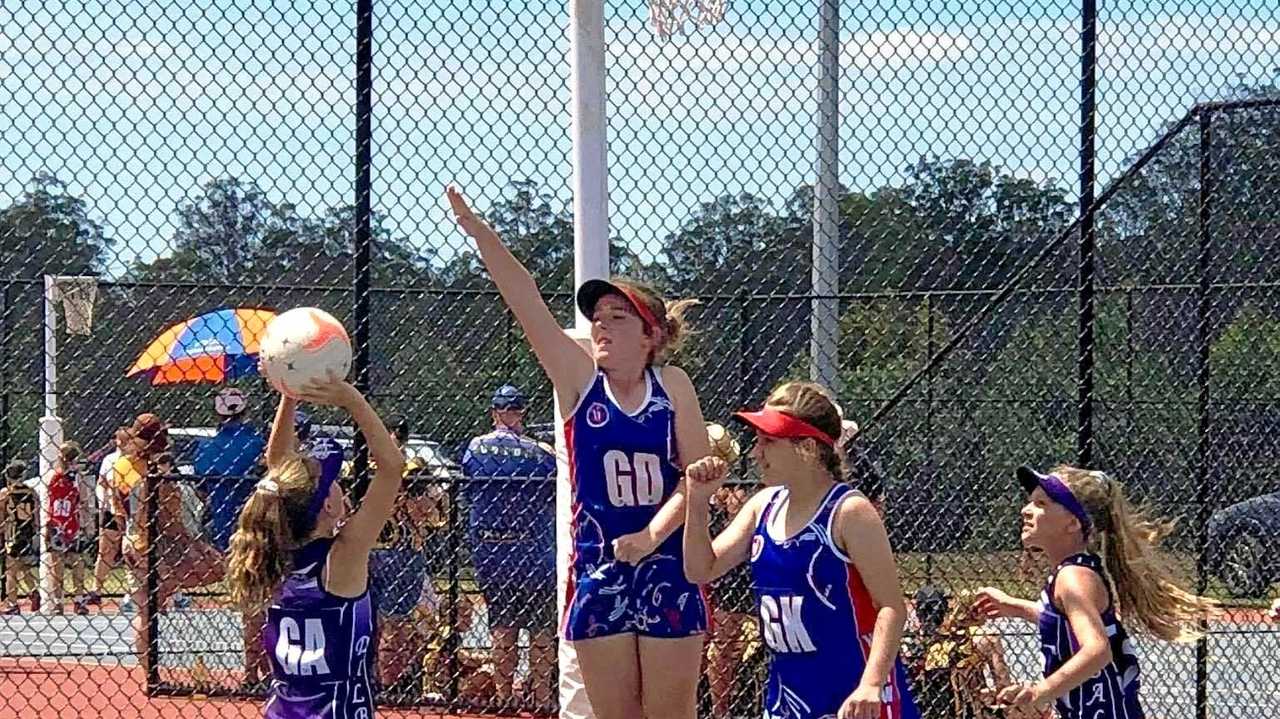 Warwick players Kaitlen Ryan (GD) and Lilly Jones (GK) in action for the 12 Years Shooting Stars team against Dalby. Picture: Contributed