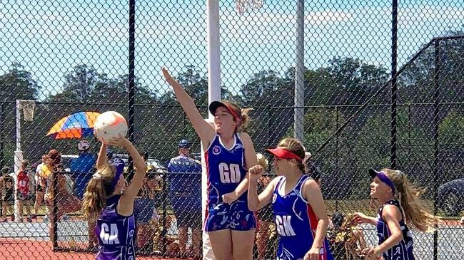 Warwick players Kaitlen Ryan (GD) and Lilly Jones (GK) in action for the 12 Years Shooting Stars team against Dalby. Picture: Contributed