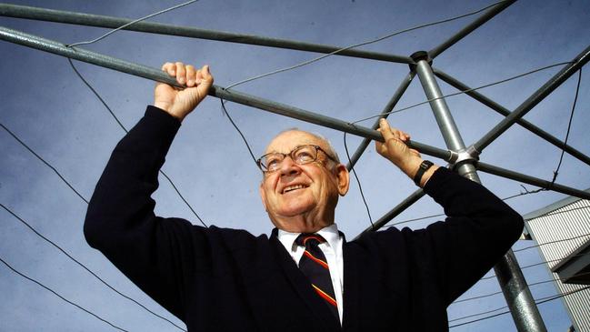 Former Hills Industries chairman Bob Hill-Ling pictured with the classic old style ‘super hoist’ at the Hills factory in Edwardstown.