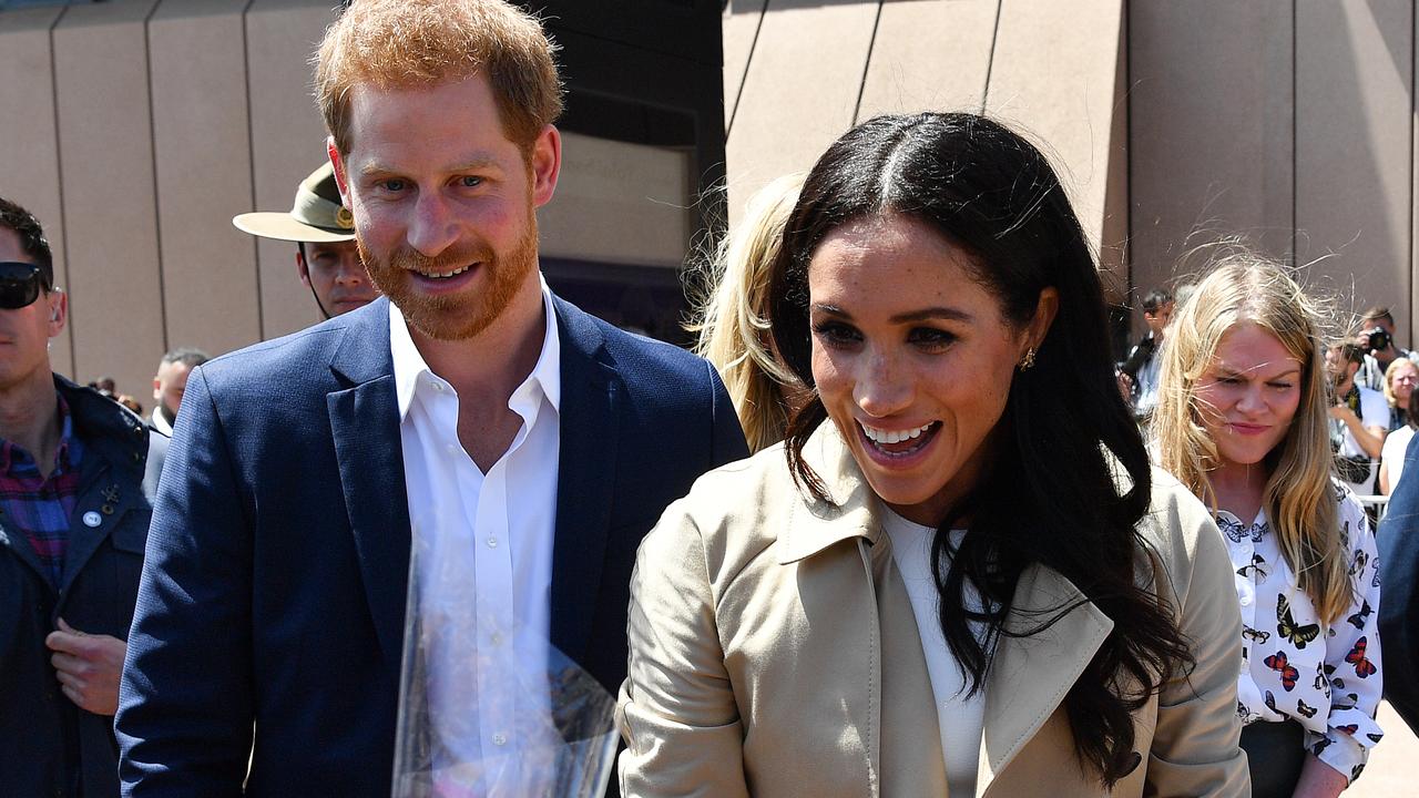 Harry and Meghan meeting fans at the Opera House yesterday. Picture: AAP Image/Brendan Esposito