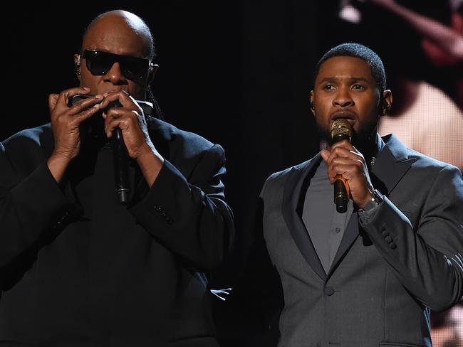 A bit of Grammys magic ... Stevie Wonder and Usher. Picture: Larry Busacca/Getty Images for NARAS