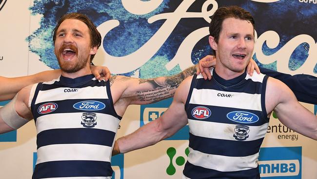 Zach Tuohy and Patrick Dangerfield. (Photo by Quinn Rooney/Getty Images)