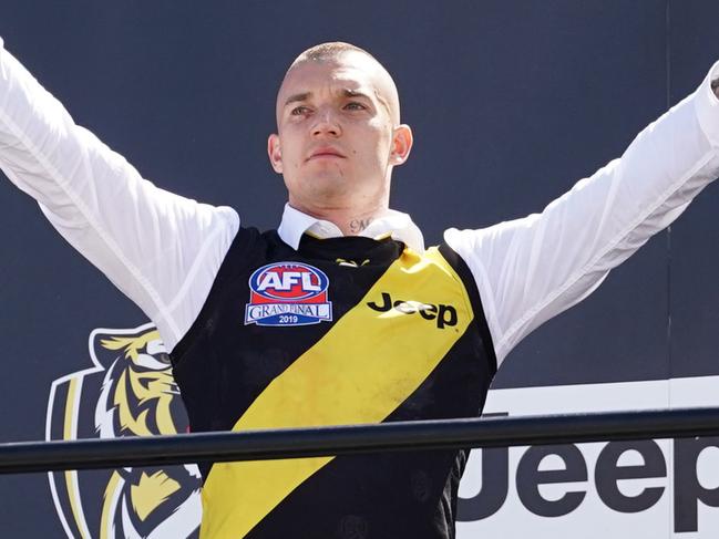 Dustin Martin Tigers celebrates their team's victory in the 2019 AFL Grand Final in Melbourne, Sunday, September 29, 2019. Richmond have beaten GWS by 89 points in the AFL grand final at the MCG. (AAP Image/Michael Dodge) NO ARCHIVING