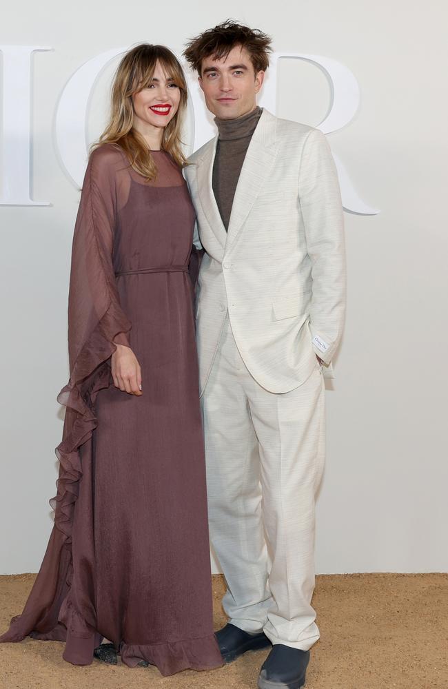 Suki Waterhouse and Robert Pattinson make their red carpet debut. (Photo by Pascal Le Segretain/Getty Images For Christian Dior)