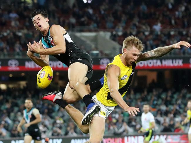 Port Adelaide’s Connor Rozee tries to make over Richmond’s Nathan Broad. Picture: Sarah Reed