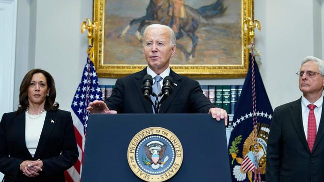 US President Joe Biden speaks from the Roosevelt Room of the White House as Vice President Kamala Harris and Attorney General Merrick Garland look on. Picture: AFP