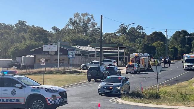 Emergency services respond the scene where four police officers were injured at Meringandan, outside Toowoomba in southeast Queensland, on Wednesday. Picture: Michael Nolan