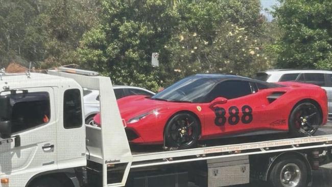 Mr Huynh’s Ferrari being seized by the police. Picture: Facebook