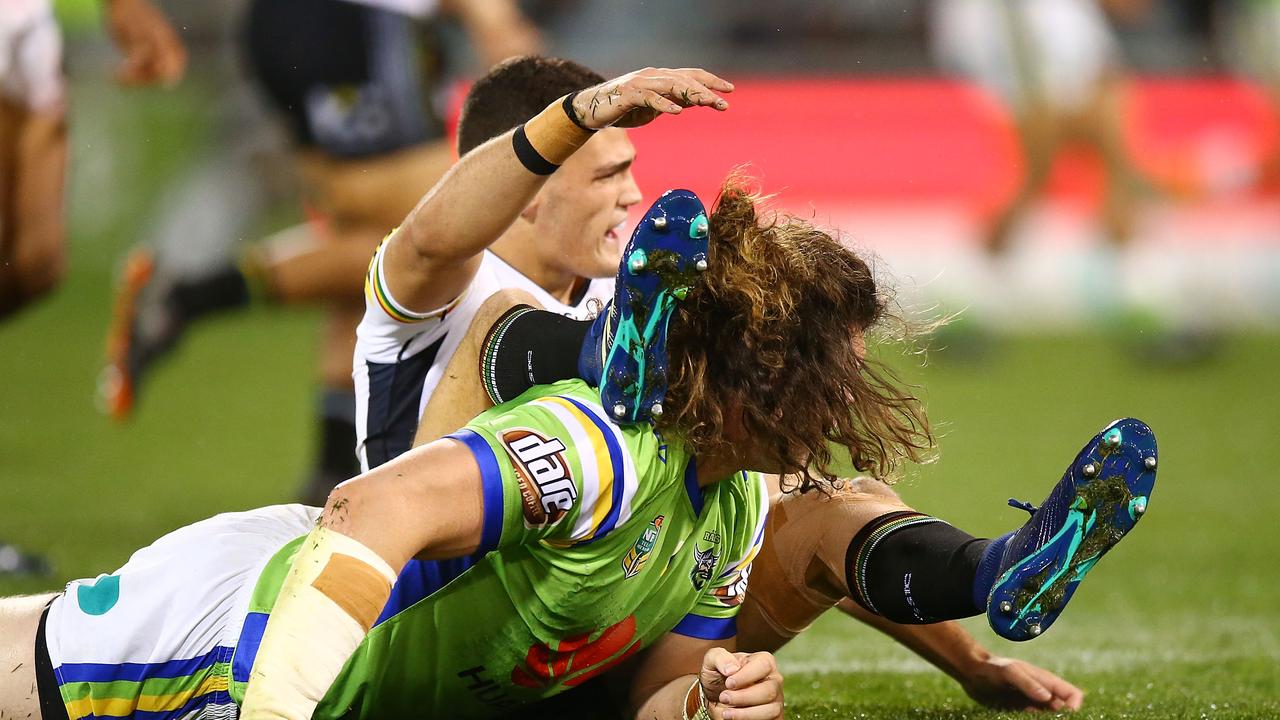 Charlie Gubb takes out the legs of Panthers playmaker Nathan Cleary.
