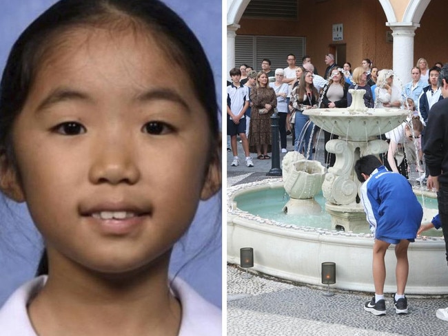 Hundreds of members of a quiet Gold Coast suburb where a young girl was allegedly murdered have shared their tears and tributes at a touching vigil a short distance from the child’s home.