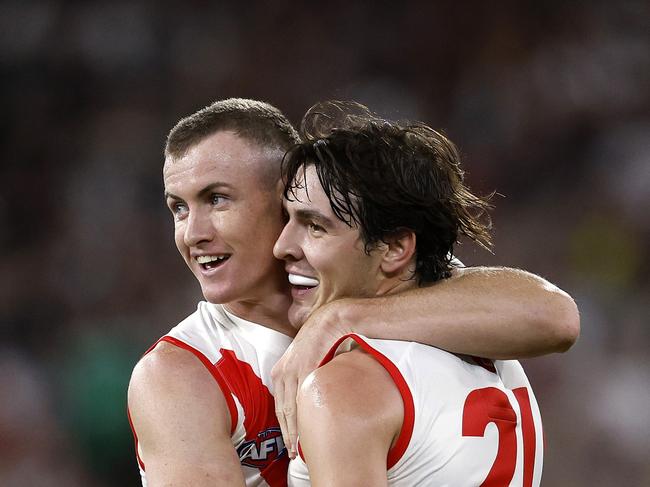 Sydney's Chad Warner and Errol Gulden celebrate setting up a goal to Logan McDonald during the Round 1 AFL match between the Collingwood Magpies and the Sydney Swans at the MCG on March 15, 2024. Photo by Phil Hillyard(Image Supplied for Editorial Use only - Phil Hillyard  **NO ON SALES** - Â©Phil Hillyard )