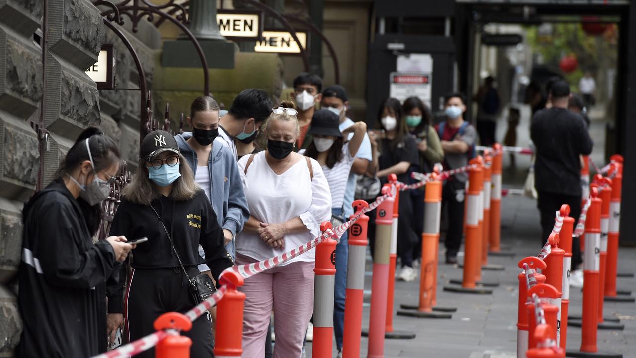 People queue for Covid tests at the Melbourne Town Hall. Picture: NCA NewsWire / Andrew Henshaw