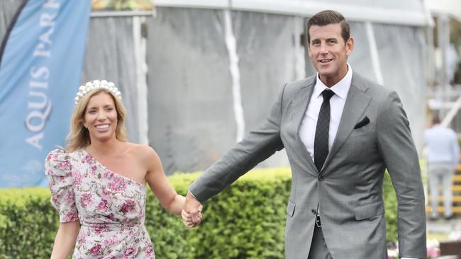 Mr Roberts-Smith appeared in good spirits, frocked up with Ms Matulin at the Magic Millions race day on the Gold Coast. Picture: Matrix