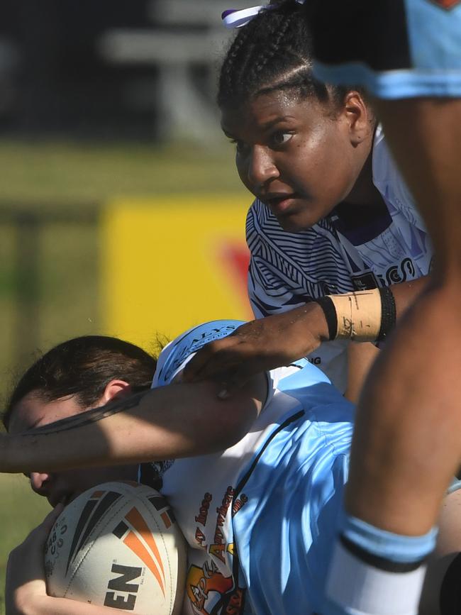 Northern Sharks' player takes on Darwin Brothers' women in the Humpty Dumpty Foundation round of 2022 NRLNT season. Picture: (A)manda Parkinson