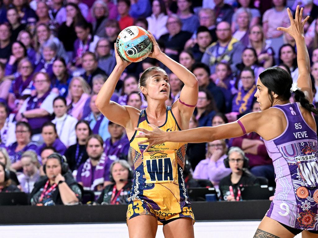 Lightning wing attack Liz Watson looks to pass during the clash with the Firebirds. Picture: Bradley Kanaris/Getty Images