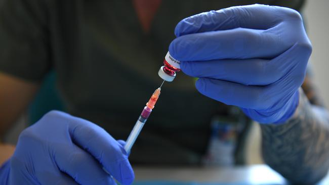 A pharmacist demonstrates the filling of syringes ahead of the Covid-19 vaccine rollout. Picture: NCA NewsWire/Joel Carrett