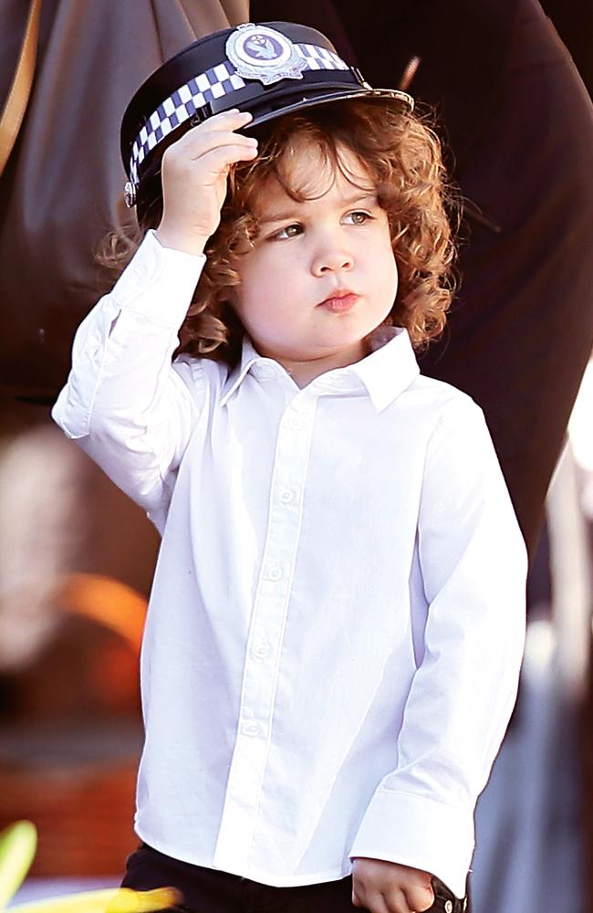 Heartbreak … Tara McLaughlin’s son Flynn Tobin wears his mother’s police hat at her funeral in 2015. Picture: Peter Clark