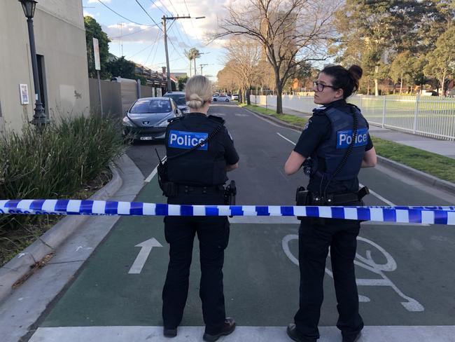 Police tape off the scene after reports of a shooting in Leeds St, Richmond. Picture: Alex Coppel