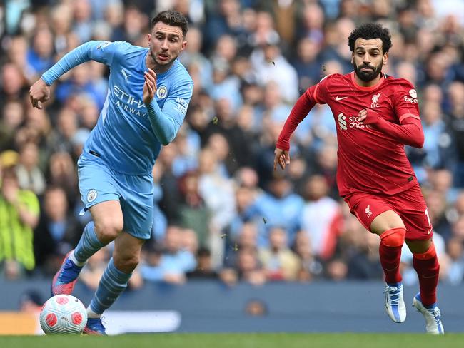 Liverpool star Mohamed Salah vies with Manchester City defender Aymeric Laporte during their English Premier League clash at the Etihad Stadium. A 2-2 draw leaves the Reds chasing the Sky Blues. Picture: Paul Ellis/AFP