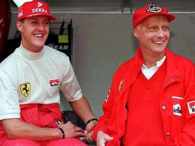 Michael Schumacher with fellow F1 legend, the late Niki Lauda. Picture: AP